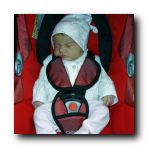 Week 4 - Tucked up in car seat