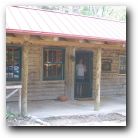 Our little log cabin. Temperatures were in the 90s.