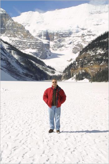 Stuart in the middle of frozen Lake Louise.