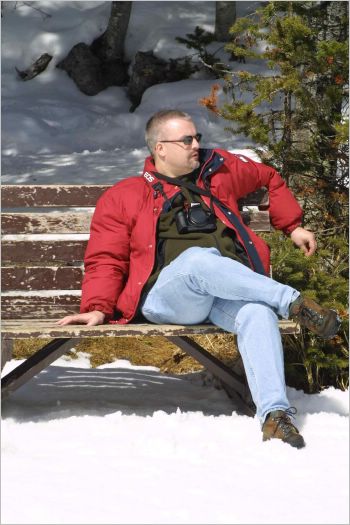 Quiet reflection by frozen Lake Louise and enjoying the fresh air!