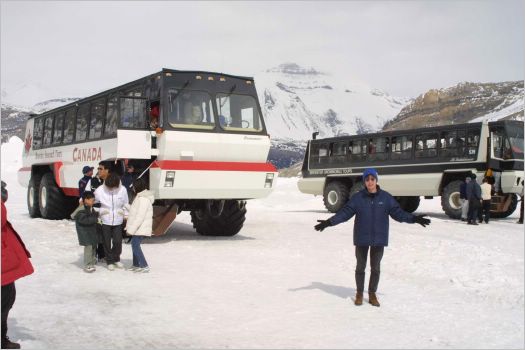 Standing in front of a Snocoach, Columbia Icefield, on the largest accummulation of ice and snow south of the Artic Circle. 