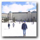 Me standing on frozen Lake Louise in front of hotel