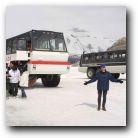 Standing in front of a Snocoach, Columbia Icefield, on the largest accummulation of ice and snow south of the Artic Circle. 