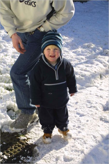 Kyle's first time to witness snow. He was amazed!