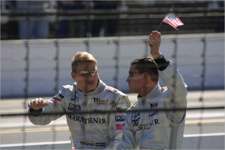 To the left, Mika Hakkinnen with David Coulthard waving. He didn't see me wave back!