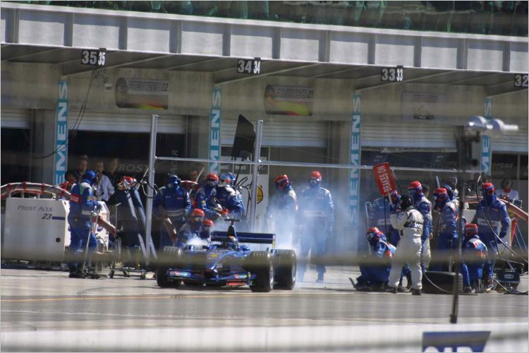 Heinz Harold Frentzen exits the pit lane.