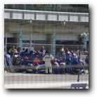 Pit crew working on Heinz Harold Frentzen's car.