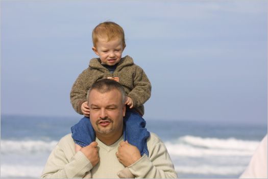 Gavin is holding on to Stuart's ears!