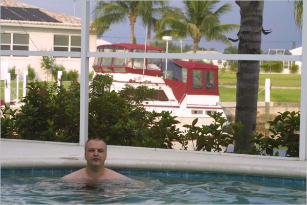 The house backed onto a canal - see the moored boat behind Stuart.