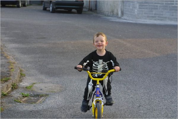 I just can't go to bed yet as there's still time to ride my bike, even though I'm in my jammies! 