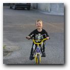I just can't go to bed yet as there's still time to ride my bike, even though I'm in my jammies! 