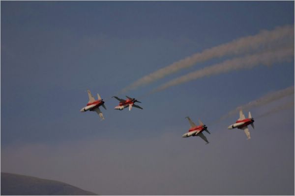 Skilled Swiss pilots fooling around.