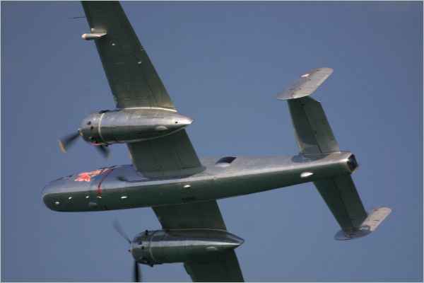 The sun bounced off this shiny plane which had Red Bull painted on the side. 