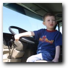The little devil knows exactly how to drive it too!