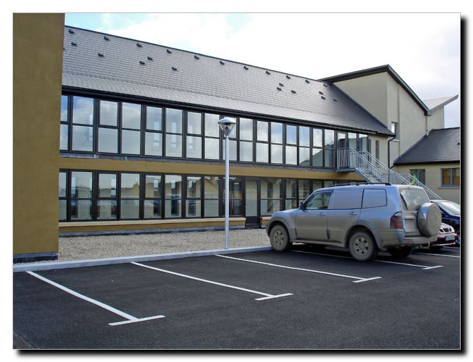Back view of the hotel. Parking provided.