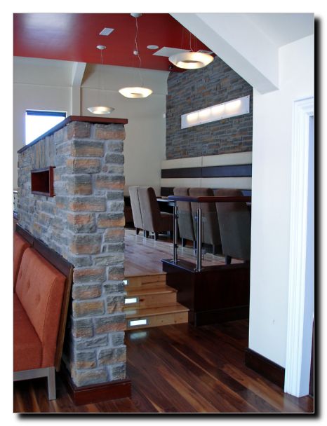 A snug cut-off area on the top floor Bar