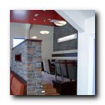 A snug cut-off area on the top floor Bar