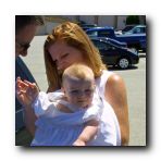 It was so hot that Mom and Dad dressed me in the car park outside the church. Hope no-one saw my diaper!