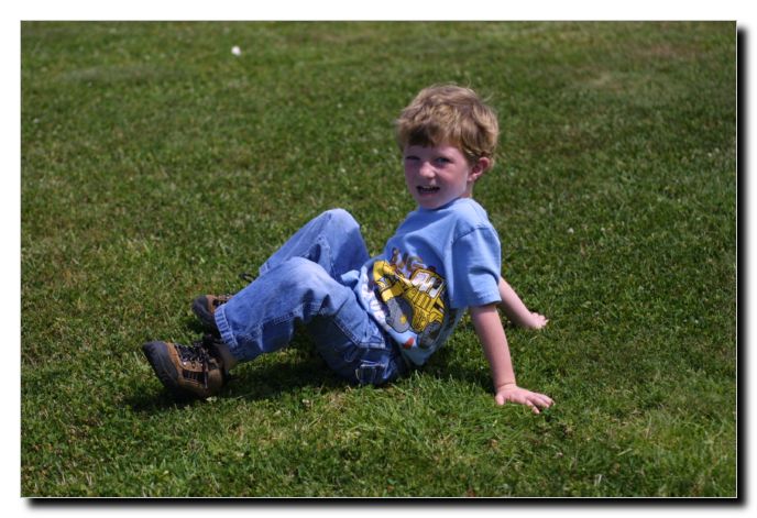 Rolling around in the garden because he could!
