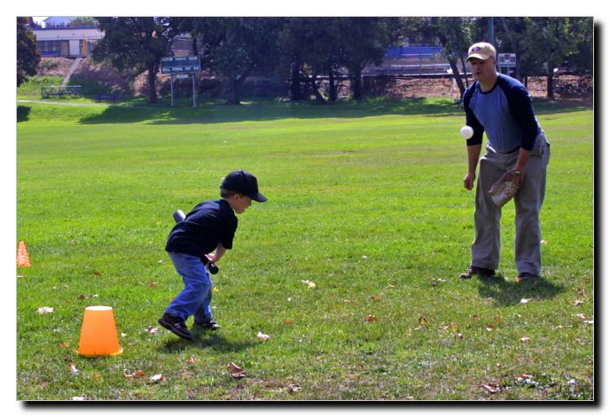 Gavin hits the ball just in front of Buddy