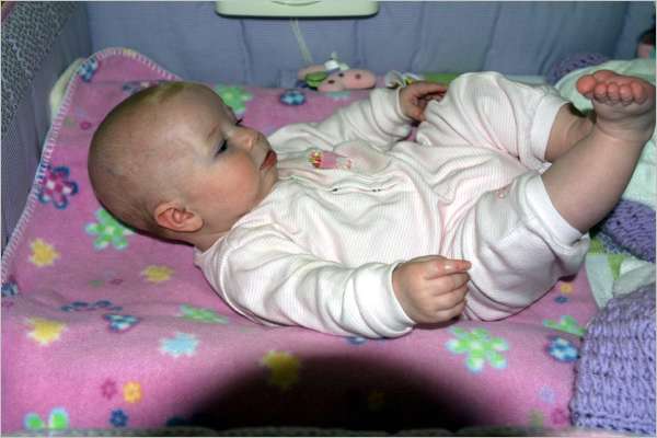 Rylie does her Abs! Go girl. This is her second day of discovering her feet.