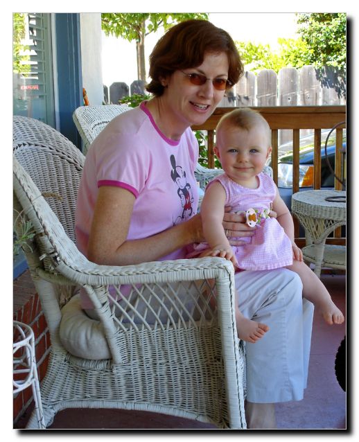 A baby sitting on my knee and one growing inside! I was still suffering from evening sickness at the time!